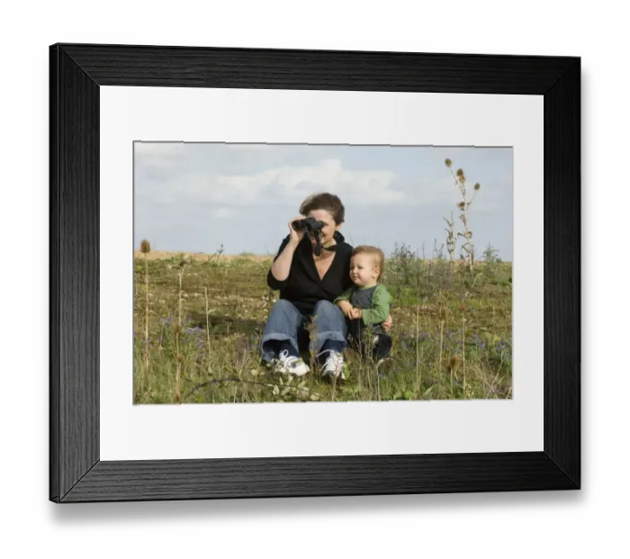 Framed Print : Mother and toddler looking at birds on a windy day at Snettisham RSPB Reserve North Framed Print : Mother and toddler looking at birds on a windy day at Snettisham RSPB Reserve North