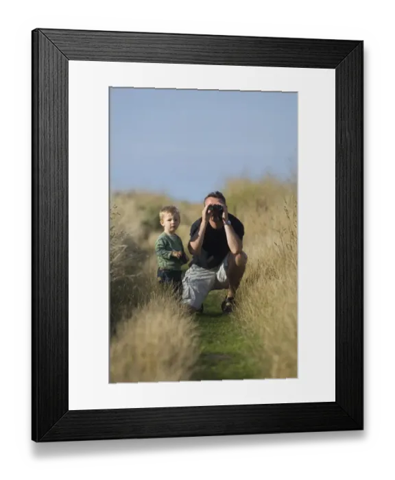Framed Print : toddler bird watching Cley North Norfolk August Framed Print : toddler bird watching Cley North Norfolk August