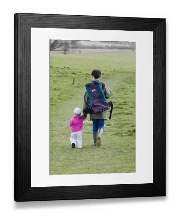 Framed Print : Mother and daughter on country walk Norfolk spring Framed Print : Mother and daughter on country walk Norfolk spring