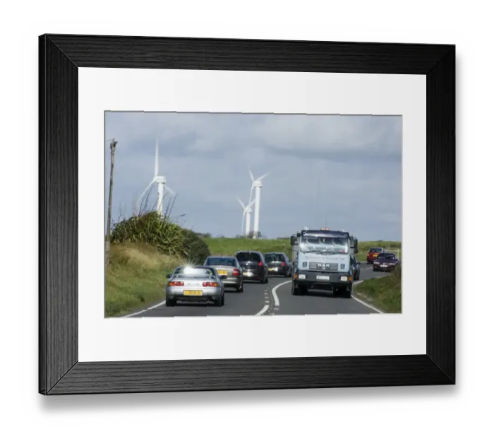 Framed Print : Wind turbines and cars along road near Goonhilly Down Cornwall summer Framed Print : Wind turbines and cars along road near Goonhilly Down Cornwall summer