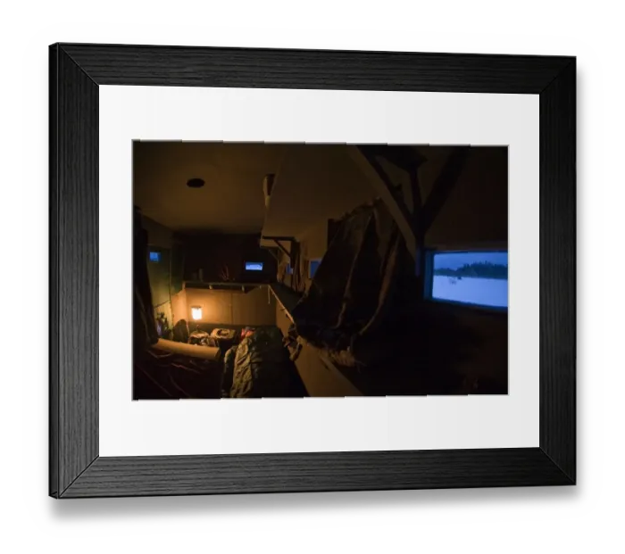 Framed Print : Midnight in bear photography hide with Wildlife photographer Jari Peltomaki sleeping Framed Print : Midnight in bear photography hide with Wildlife photographer Jari Peltomaki sleeping