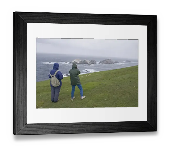 Framed Print : Walkers looking out on Britains most northerly point Muckle Flugga off Hermaness Framed Print : Walkers looking out on Britains most northerly point Muckle Flugga off Hermaness