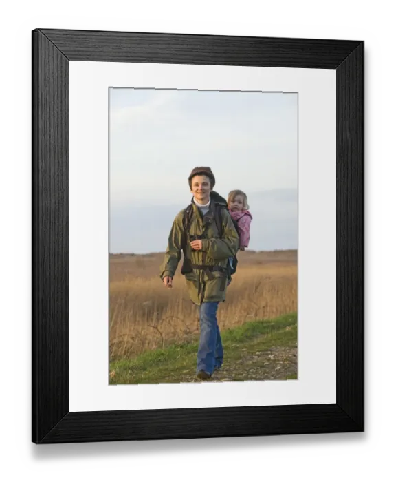Framed Print : mother carrying toddler in backpack while bird watching along coastal path North Framed Print : mother carrying toddler in backpack while bird watching along coastal path North