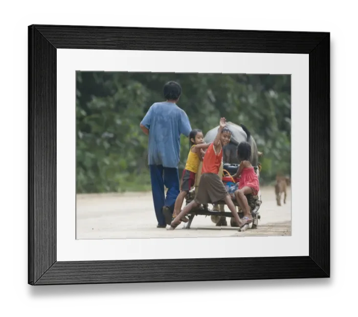 Framed Print : Farming family on way home through forest near Sabang on Palawan Philippines Framed Print : Farming family on way home through forest near Sabang on Palawan Philippines