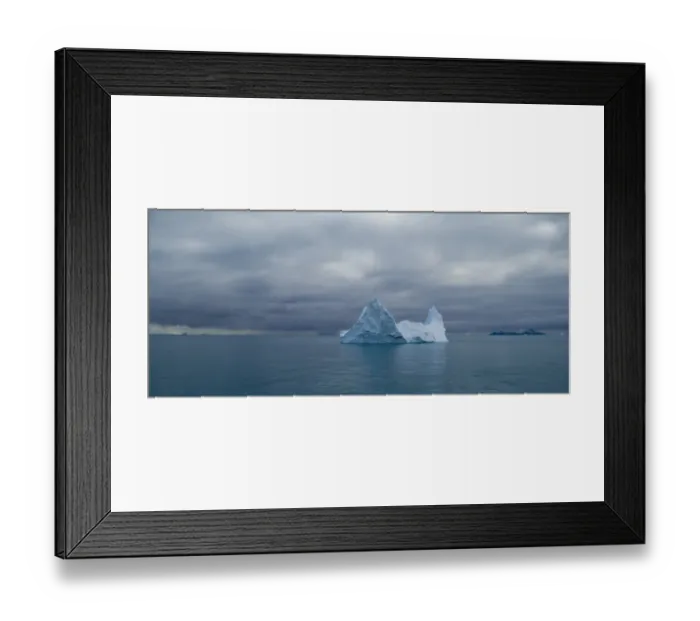 Framed Print : Iceberg on the south west side of South Georgia with Annekov Island in background Framed Print : Iceberg on the south west side of South Georgia with Annekov Island in background