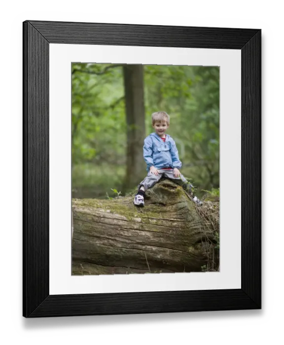 Framed Print : Boy playing in woodland Norfolk spring Framed Print : Boy playing in woodland Norfolk spring