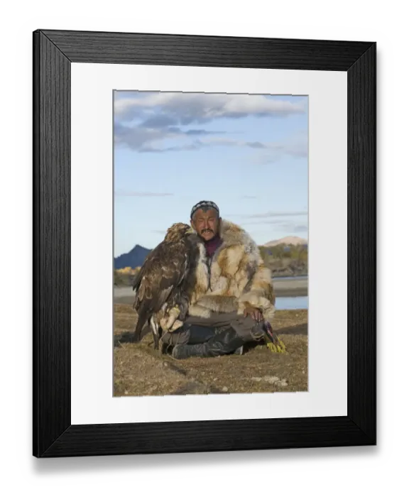 Framed Print : Dalai Han an Kazakh eagle hunter with his Golden Eagle Bayan Ulgii in Altai Mountains Framed Print : Dalai Han an Kazakh eagle hunter with his Golden Eagle Bayan Ulgii in Altai Mountains