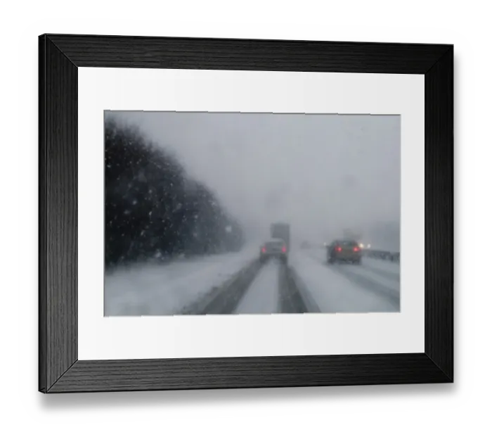 Framed Print : View through car windscreen during heavy snowfall on A47 Norfolk December 2009 Framed Print : View through car windscreen during heavy snowfall on A47 Norfolk December 2009