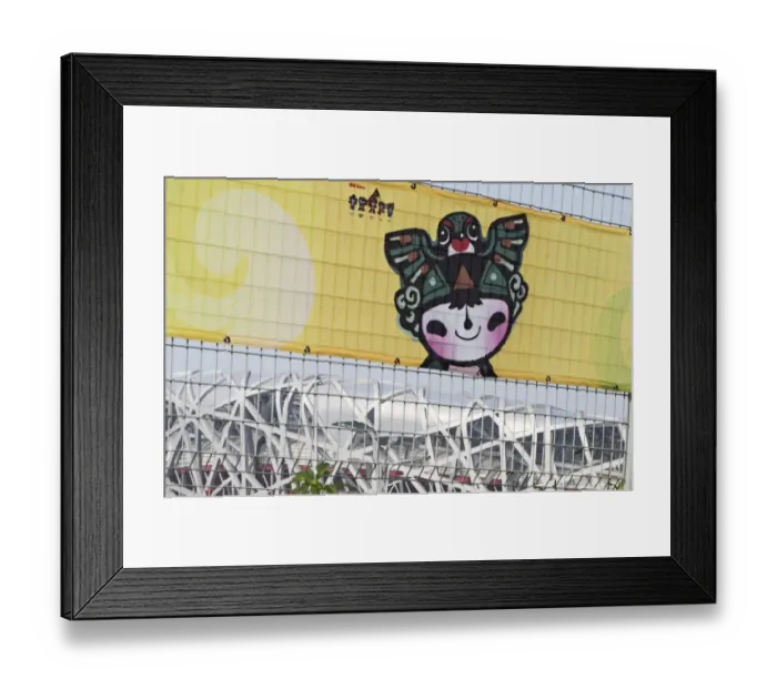 Framed Print : Nini a representation of a swallow as one of the five child mascots for the 2008 Framed Print : Nini a representation of a swallow as one of the five child mascots for the 2008