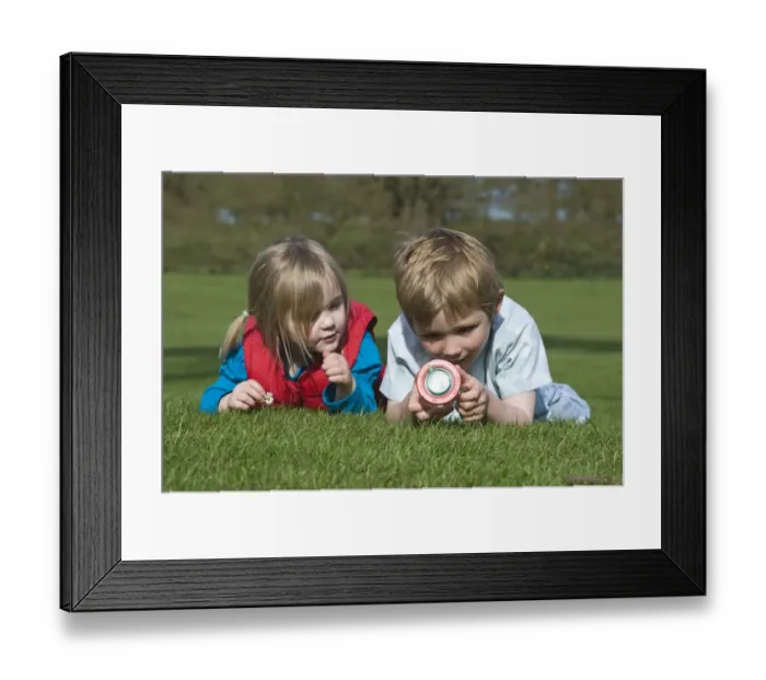 Framed Print : Children looking at ladybirds in bug collecting jar Norfolk spring Framed Print : Children looking at ladybirds in bug collecting jar Norfolk spring