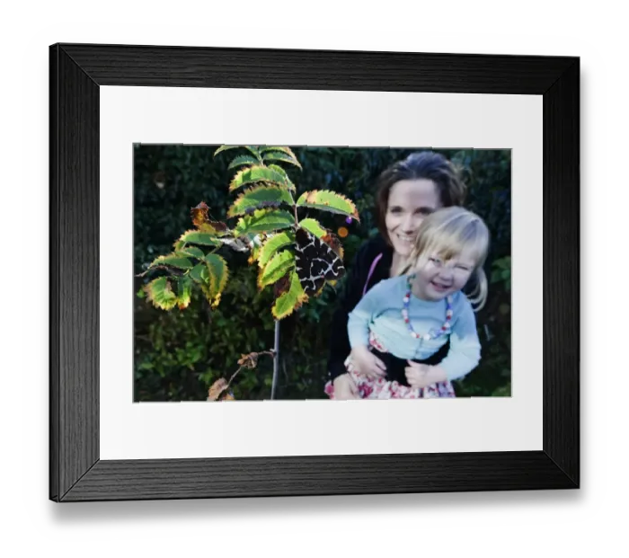 Framed Print : Jayne Smith and daughter Charlotte looking at Garden Tiger Moth recently hatched Framed Print : Jayne Smith and daughter Charlotte looking at Garden Tiger Moth recently hatched