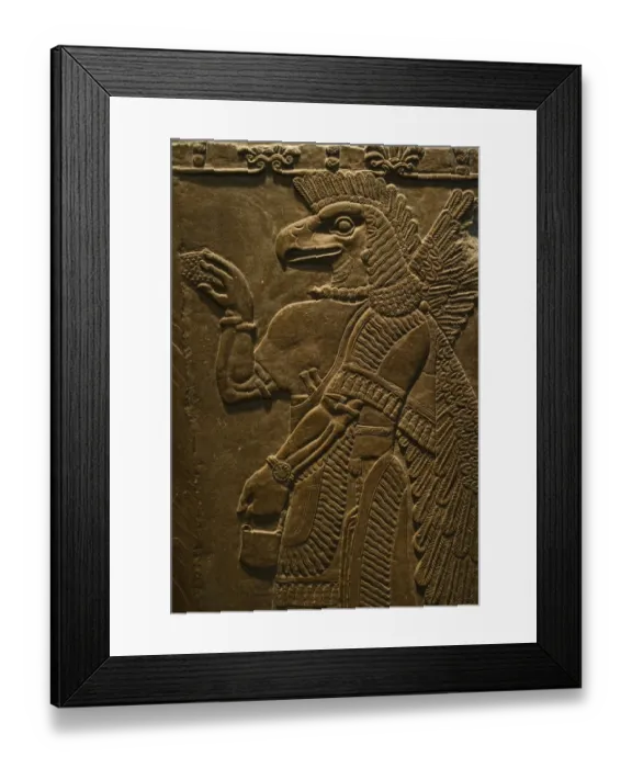 Framed Print : Sculptured wall relief depicting an Eagle headed protective Spirit from Temple of Framed Print : Sculptured wall relief depicting an Eagle headed protective Spirit from Temple of