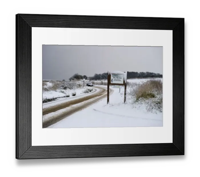 Framed Print : A149 coast road covered in snow at Cley NWT Reserve Cley Norfolk December Framed Print : A149 coast road covered in snow at Cley NWT Reserve Cley Norfolk December