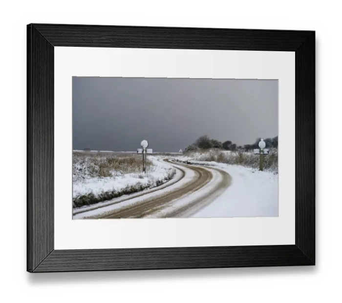 Framed Print : A149 coast road covered in snow at Cley NWT Reserve Cley Norfolk December Framed Print : A149 coast road covered in snow at Cley NWT Reserve Cley Norfolk December