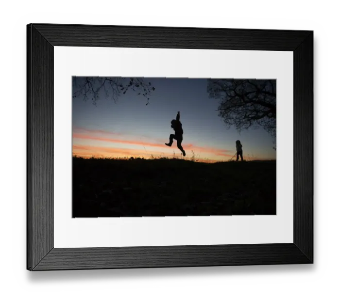 Framed Print : Young boy and girl playing at dusk on edge of woodland Norfolk winter Framed Print : Young boy and girl playing at dusk on edge of woodland Norfolk winter