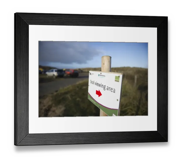 Framed Print : Sign pointing to Grey Seal colony at Winterton Norfolk December Framed Print : Sign pointing to Grey Seal colony at Winterton Norfolk December