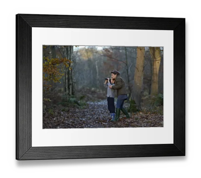 Framed Print : Mother showing son birds in woodland in autumn Norfolk Framed Print : Mother showing son birds in woodland in autumn Norfolk