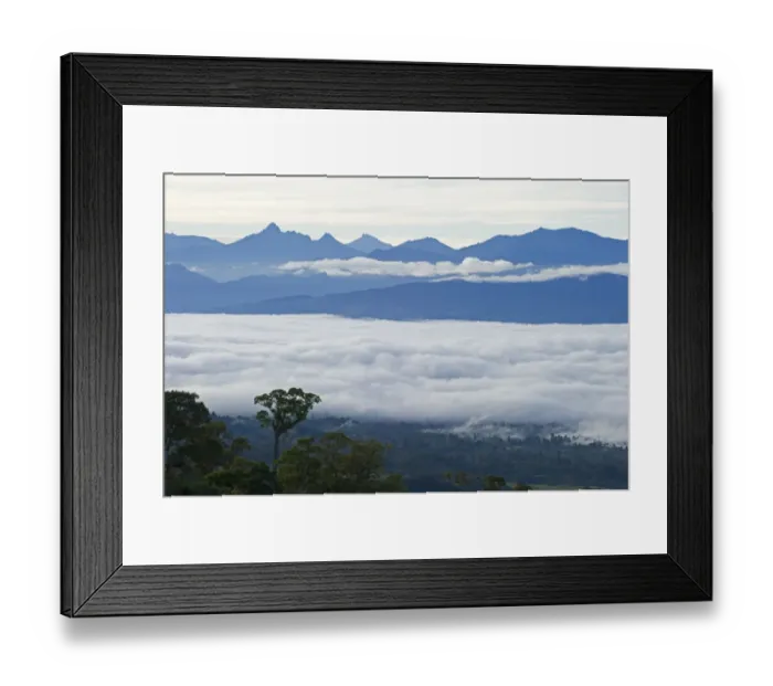Framed Print : View from Magic Mountain Lodge across cloud covered valley towards Mt Hagen in Western Framed Print : View from Magic Mountain Lodge across cloud covered valley towards Mt Hagen in Western