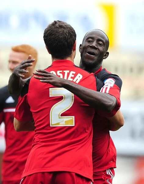 Adomah and Foster Celebrate Goal: Bristol City vs. Blackburn Rovers, Championship Football Match, Ashton Gate Stadium, 2012
