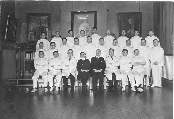 Formal group of male nurses with probable matron