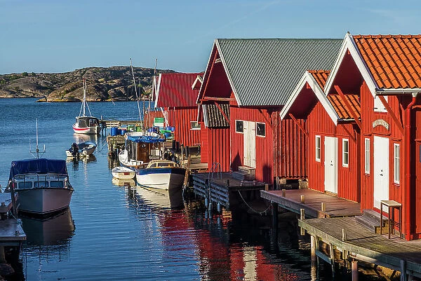 Sweden, Bohuslan, Kungshamn, red fishing shacks in the Fisketangen, old fisherman's neighborhood Date: 02-06-2019