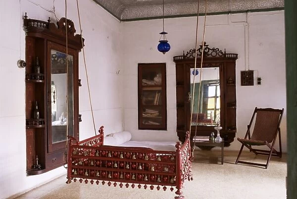 Seating area with traditional hitchkar suspended swing