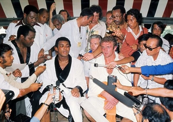 Muhammad Ali and Joe Bugner at the press conference after their second fight, in 1975