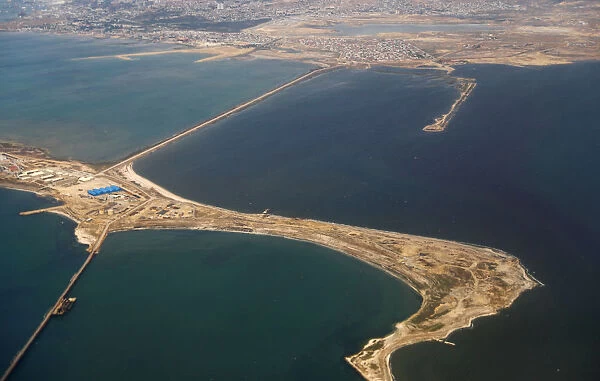 An aerial view of the Caspian Sea near the city of Baku is pictured through the window of