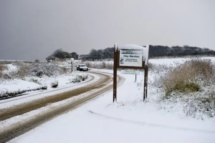Framed Print : A149 coast road covered in snow at Cley NWT Reserve Cley Norfolk December Framed Print : A149 coast road covered in snow at Cley NWT Reserve Cley Norfolk December