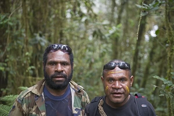 Benson and Alus, bird guides photographed on Bensons trail at Tari Papua New Guinea