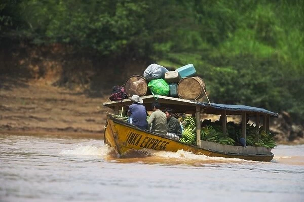 Boat carrying bananas to market up the Madre de Dios River Peruvian Amazon