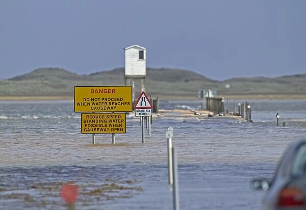Causeway to Holy Island, covered at high tide. Lindisfarne, Northumberland, UK, summer