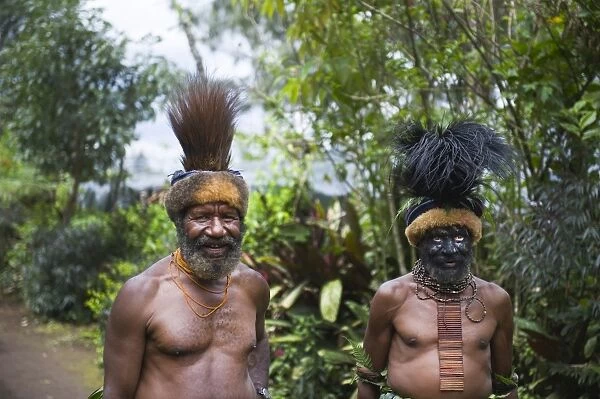 Clan chiefs at Paiya in Western Highlands Papua New Guinea Note Cassowary feather