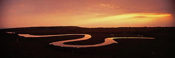 Cuckmere River, showing oxbow lakes at dusk, Cuckmere Haven, Sussex, summer