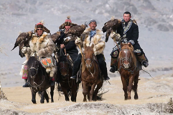 Eagle hunters on route to the Eagle Hunters festival near Ulgii in western Mongolia