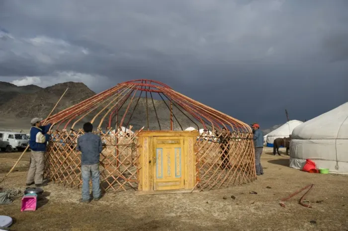 Framed Print : Erecting a Ger camp at Bayan-Ulgii in preparation for the eagle hunters festival Framed Print : Erecting a Ger camp at Bayan-Ulgii in preparation for the eagle hunters festival
