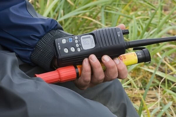 Grizzly Bear guide with radio and flare Katmai Alaska July