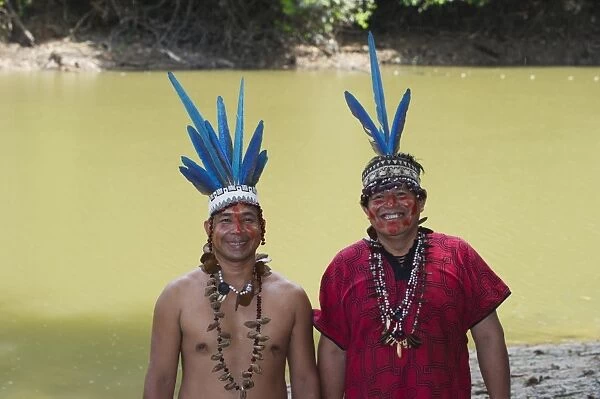 Guillermo Rodriguez Gomez Shaman for the Bora trible with his assistant (red shirt)