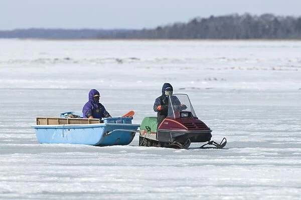 Ice fishermen on frozen Lake Fuhren Hokkaido Japan winter