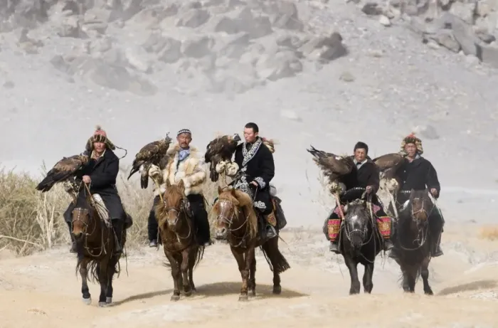 Framed Print : Kazakh eagle hunters with Golden Eagles on way to the Eagle Hunters Festival in Framed Print : Kazakh eagle hunters with Golden Eagles on way to the Eagle Hunters Festival in