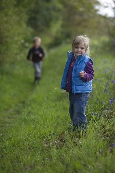 Kids playing along footpath in Norfolk countryside May