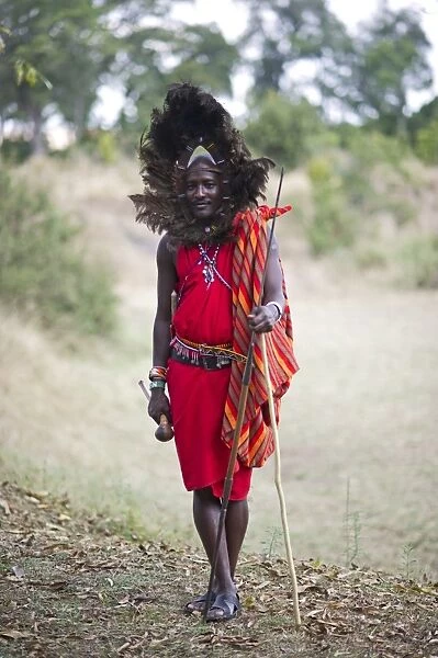 Kitkung Nampaso a Masai Warrior wearing Ostrich feather head dress as worn during