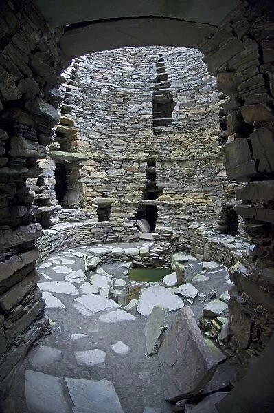Looking into the interior of Mousa Broch from doorway Mousa Shetland