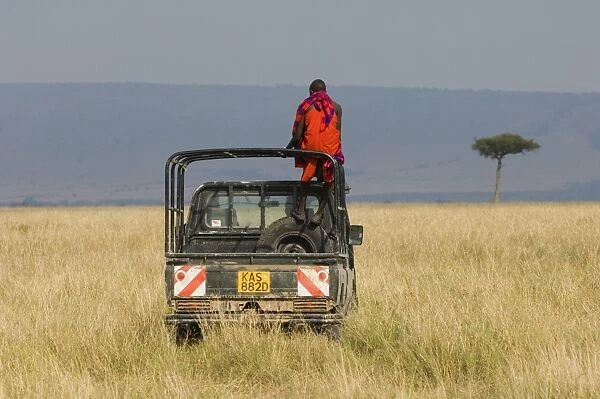 Masai on jeep in Masai Mara Kenya July