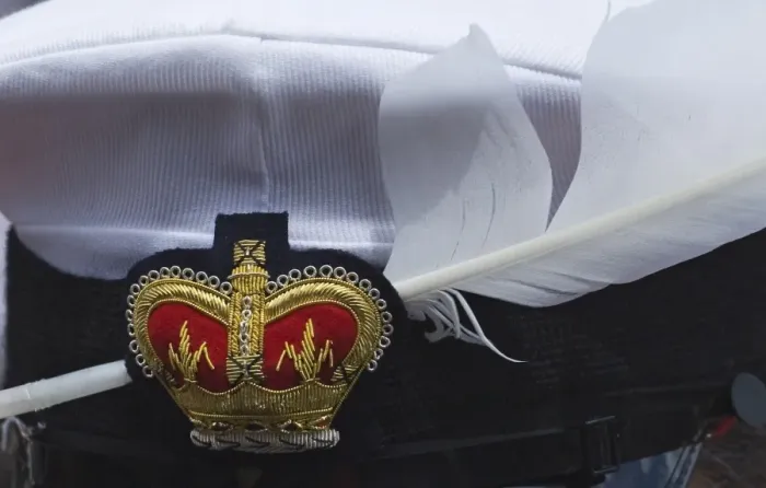 Framed Print : Mute Swans feather in The Queens Swan Marker David Barbers cap Swan Upping on River Framed Print : Mute Swans feather in The Queens Swan Marker David Barbers cap Swan Upping on River