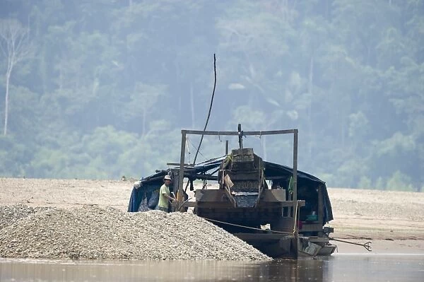 Panning for Gold on the Madre de Dios River in the Peruvian Amazon, the river boasts