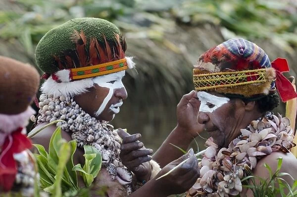 Performers preparing for a Sing-sing at Paiya Show Western Highlands Papua New Guinea