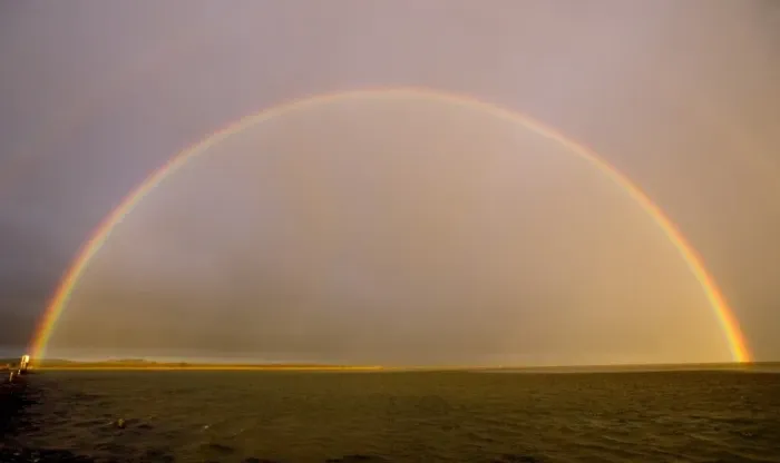 Framed Print : Rainbow over Lindisfarne Holy Island Northumberland autumn