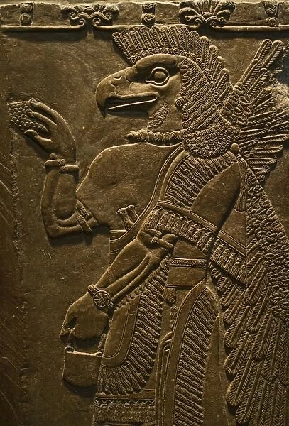 Sculptured wall relief depicting an Eagle headed protective Spirit from Temple of