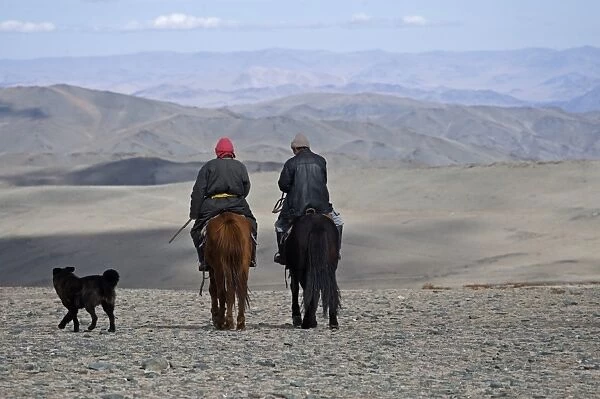 Shepherds on horseback in the Altai Mountains near Bayan-Uglii Mongolia September